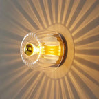 Væglampe med rund glasskærm, smedejernsfod, moderne minimalistisk