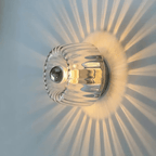 Væglampe med rund glasskærm, smedejernsfod, moderne minimalistisk