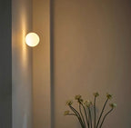 Round Frosted Glass Wall Light, Single-LED Globe Fixture, Metal Base