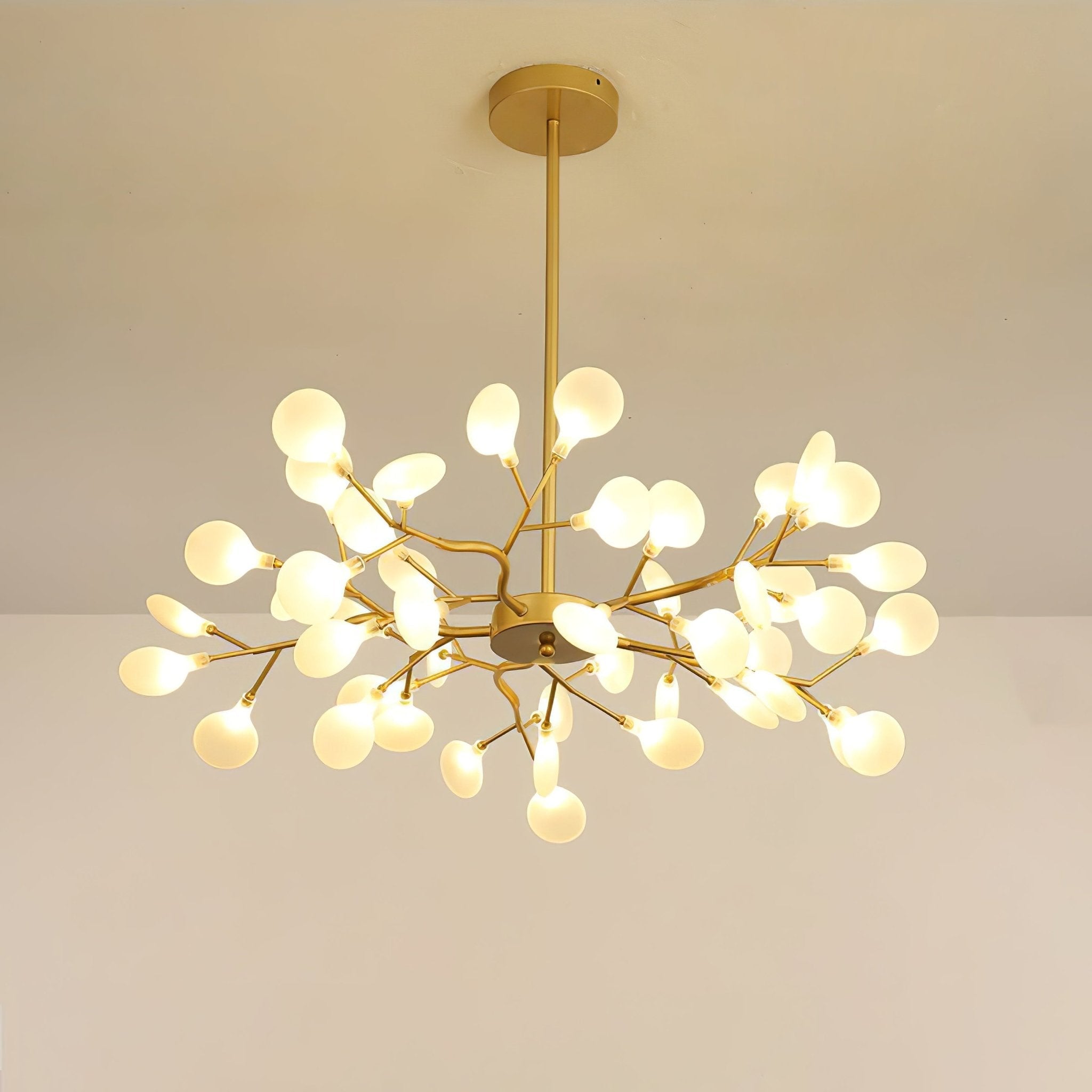 Firefly chandelier glowing softly above a living room