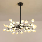 Starburst chandelier with many glass leaves catching light