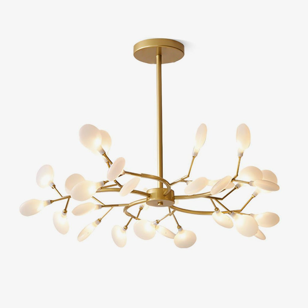 Firefly chandelier with glowing glass leaves in a dark room