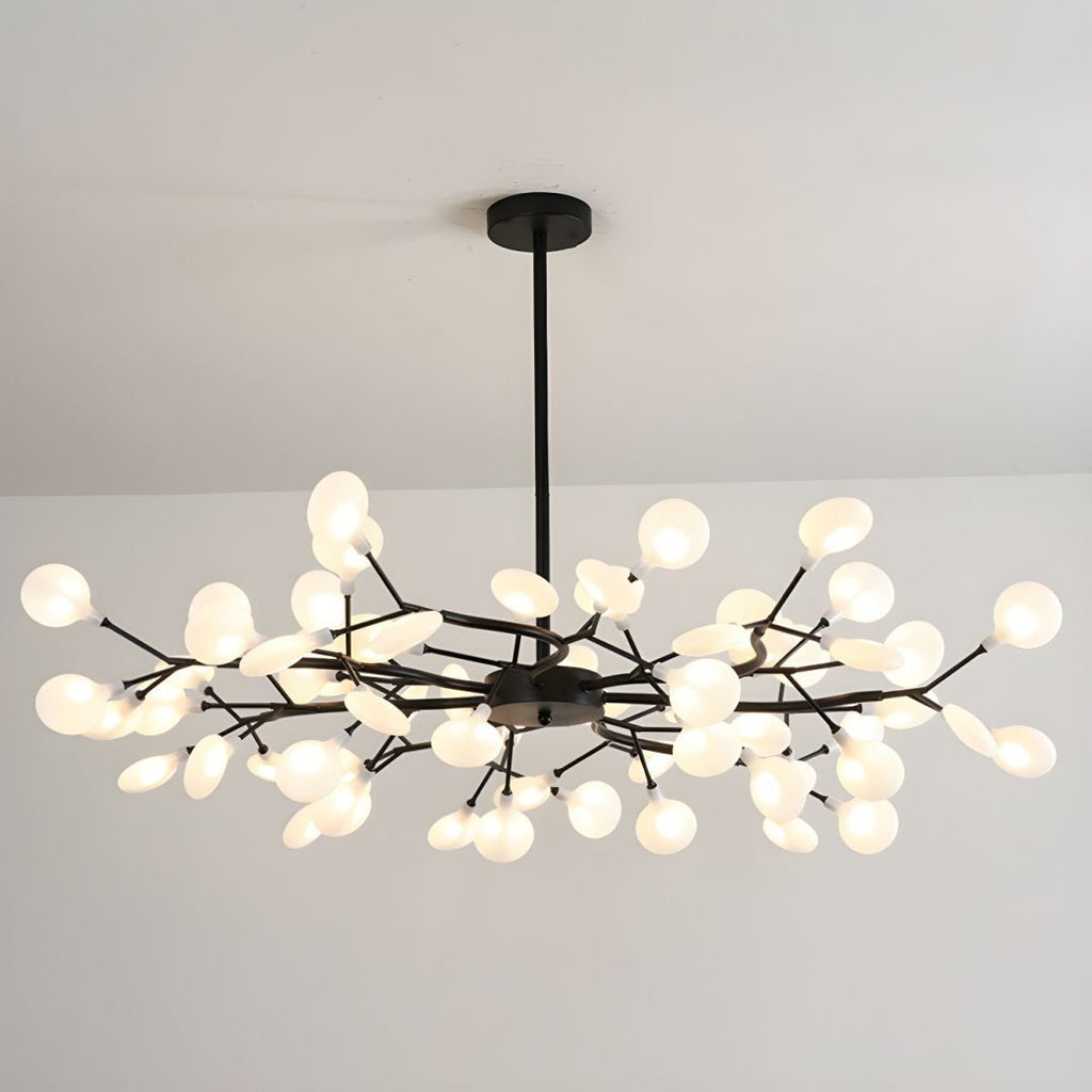 Sputnik chandelier with radiating arms above a dining table