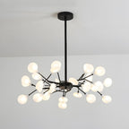 Sputnik chandelier radiating warm light from glass leaves