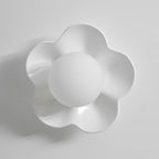 Close studio shot of this Clérachic wall light in white, unlit against a plain white backdrop.