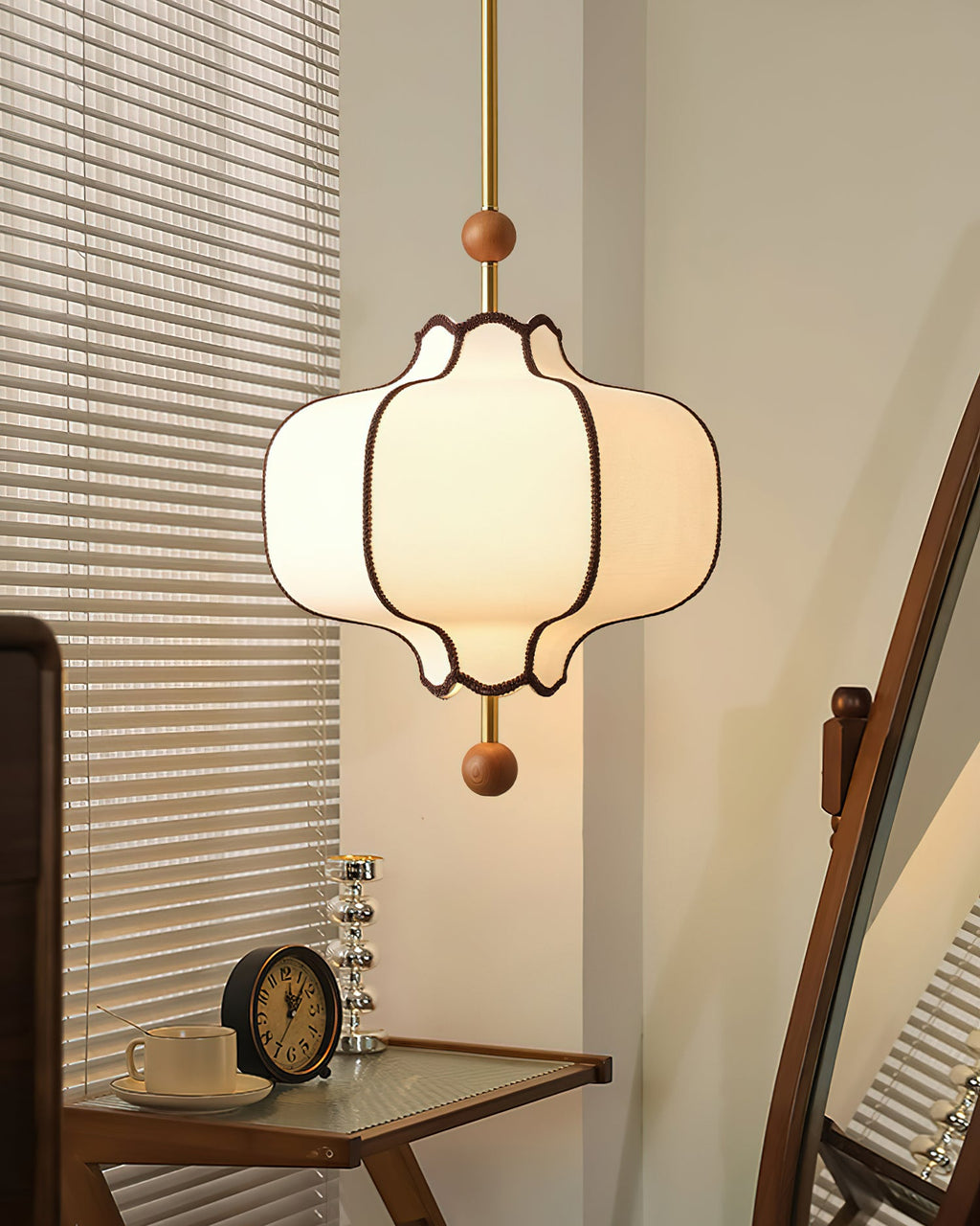 Gold-framed lantern pendant light with soft diffused light