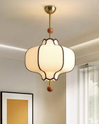 Fabric lantern pendant light detail with gold frame finish