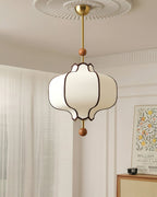 White lantern pendant light hanging at adjustable rod height