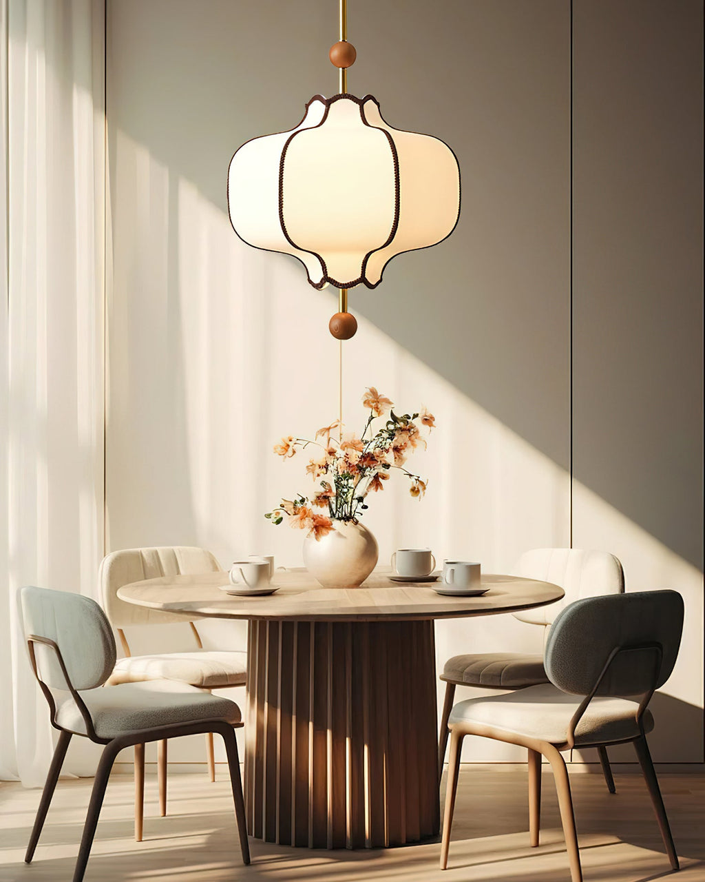 Lantern pendant light with white shade in a warm room setting