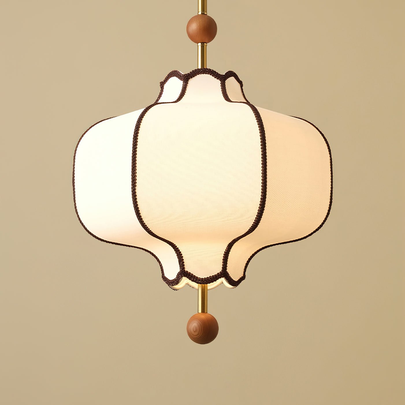 White lantern pendant light with metal frame and fabric shade
