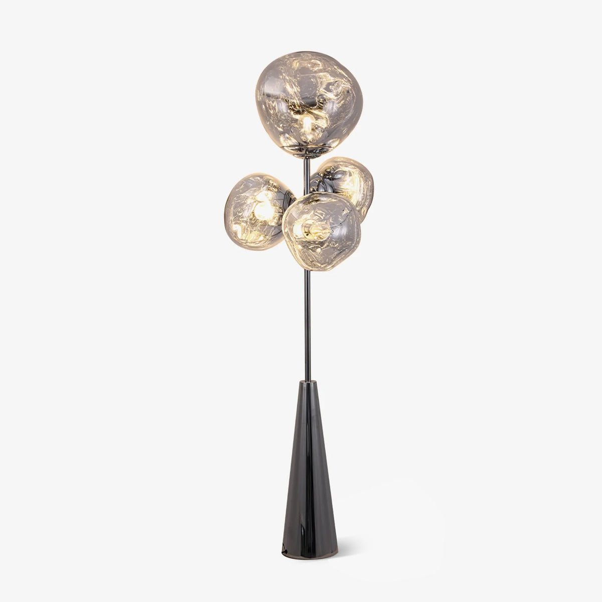 Clérachic glass-globe floor lamp glowing against a plain grey backdrop, four marbled smoke-glass globes on a black conical base.
