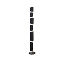 The Clérachic floor lamp shown alone on a plain white background, its black glass panels and gold pole unlit.