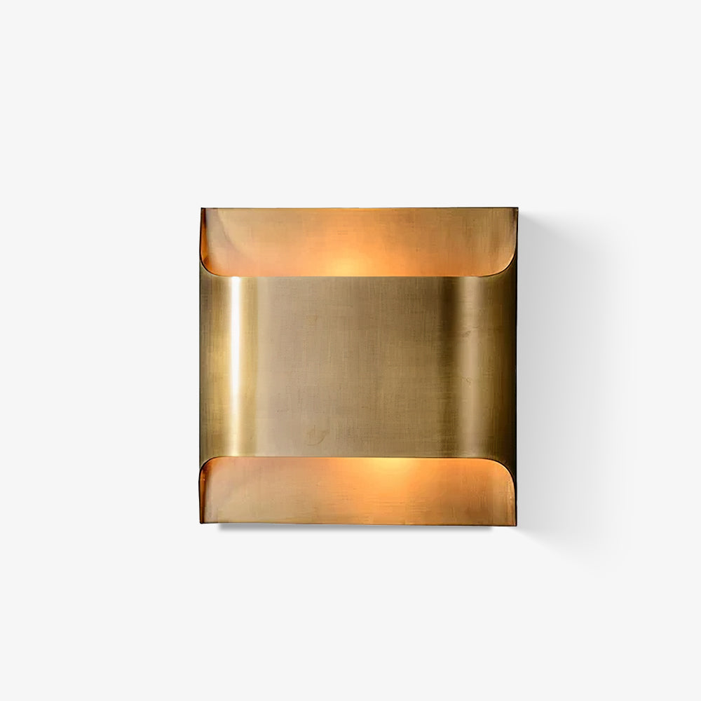 Polished brass wall sconce with a rounded globe shade
