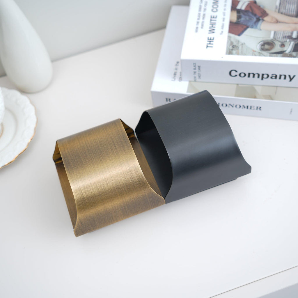 Brass wall sconce detail highlighting the polished surface