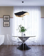 Disc pendant light with gold accent and integrated LED glow