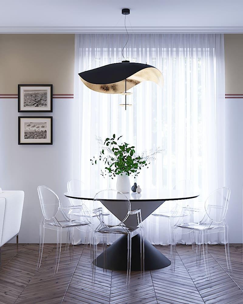 Disc pendant light with gold accent and integrated LED glow