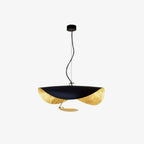 Disc pendant light shown as a clean sculptural ceiling fixture