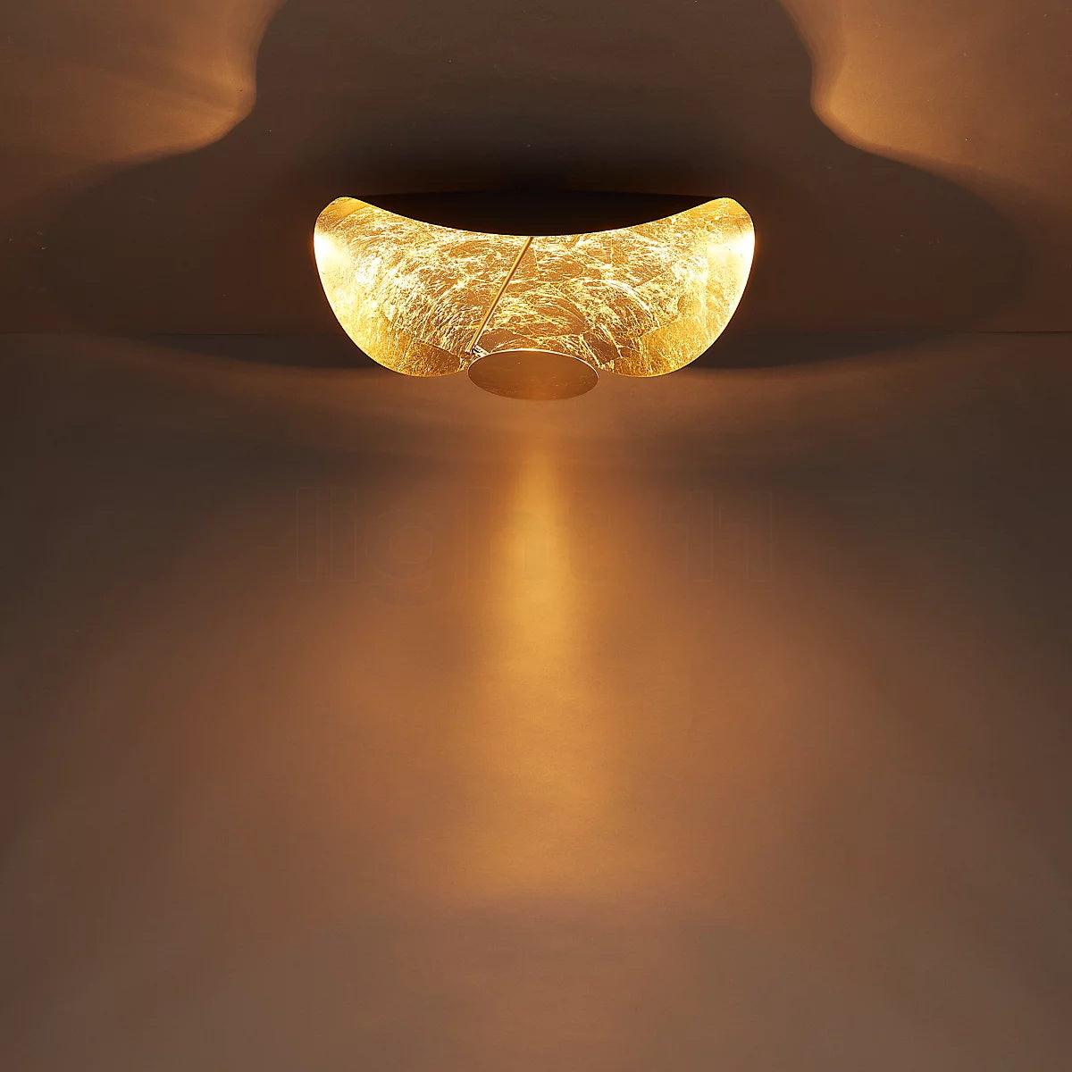Curved disc ceiling light on a slender supporting rod