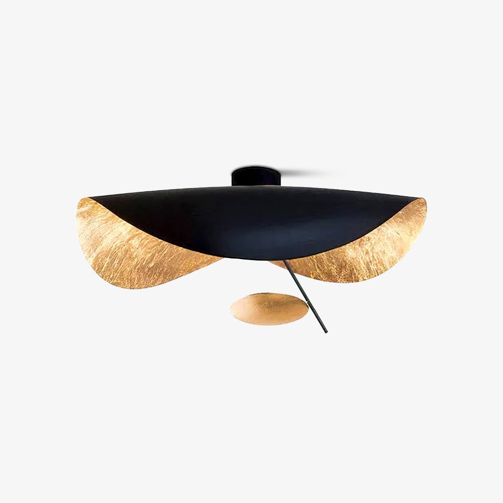 Curved disc ceiling light on a thin rod, lit warm