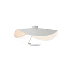 White curved disc ceiling light on a slender rod