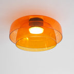 Tinted glass-disc ceiling light mounted flush overhead