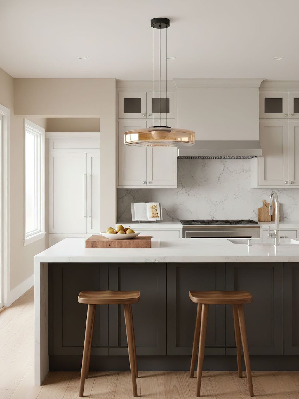 Single-disc glass pendant light glowing warm against a dark wall