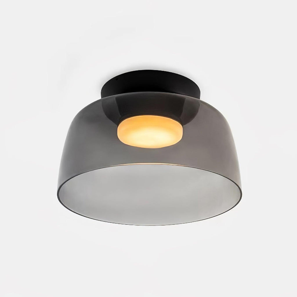 Layered tinted glass ceiling light mounted flush against the ceiling