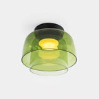 Layered glass ceiling light with black metal body and warm glow