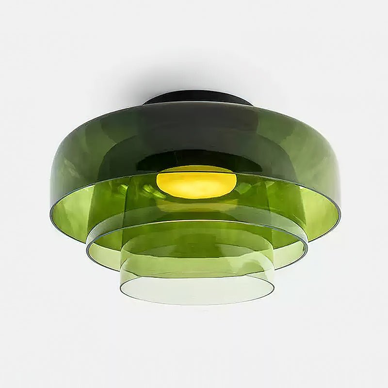 Orange tinted glass ceiling light diffusing a balanced glow