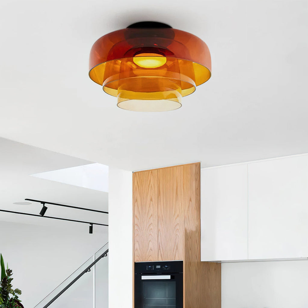 Stacked glass ceiling light casting soft even light from above