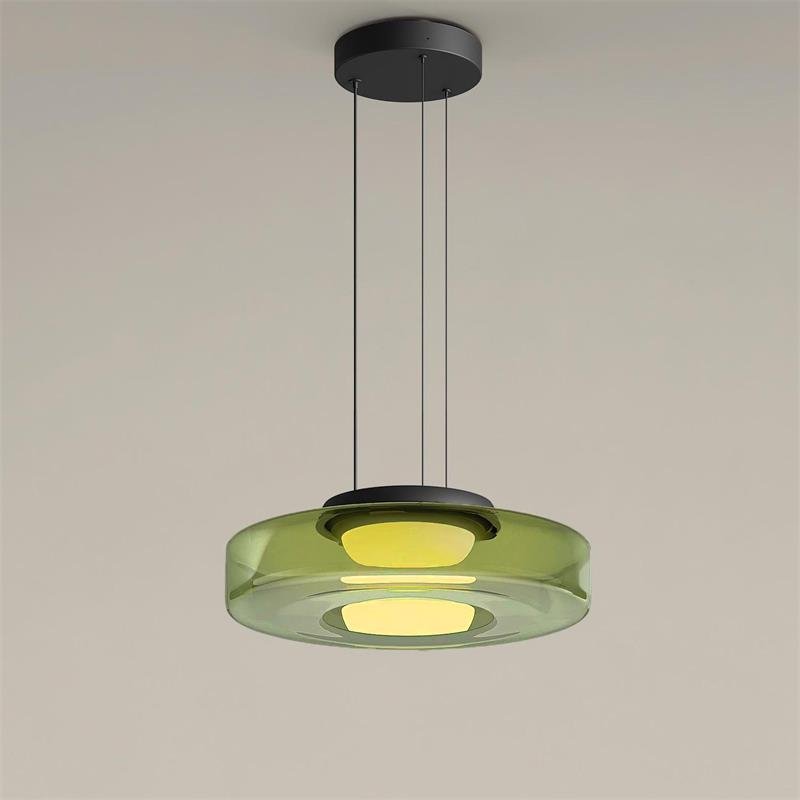 Stacked glass-disc pendant light with soft warm LED glow indoors