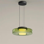 Stacked glass-disc pendant light with soft warm LED glow indoors