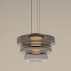 Amber-toned mouth-blown glass pendant light glowing softly indoors