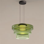 Smoke grey glass pendant light with black metal body and warm LED