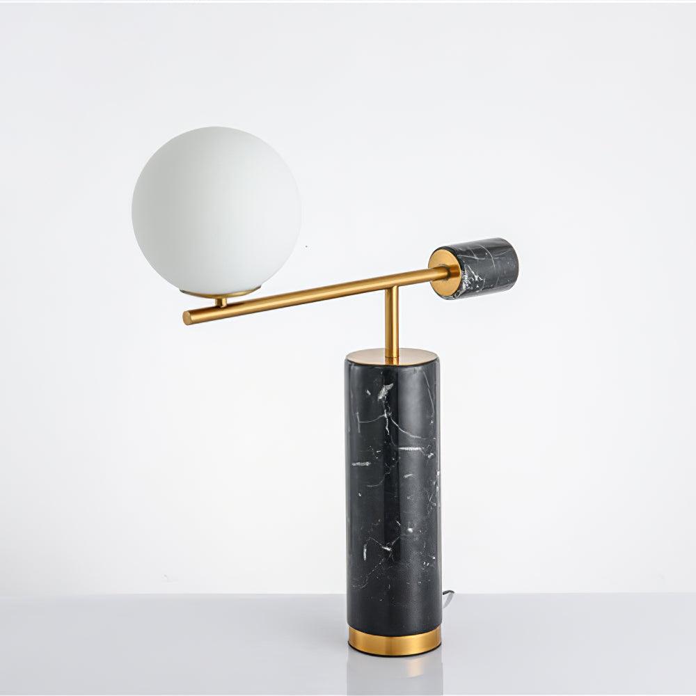 Shot at a steep angle against a grey backdrop, the Clérachic lamp's arm and globe tilt diagonally across the frame.