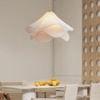 Ethereal Bloom plug-in pendant light hanging over an interior, full view of the white shade