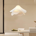 Ethereal Bloom pendant light glowing softly in a darkened room setting