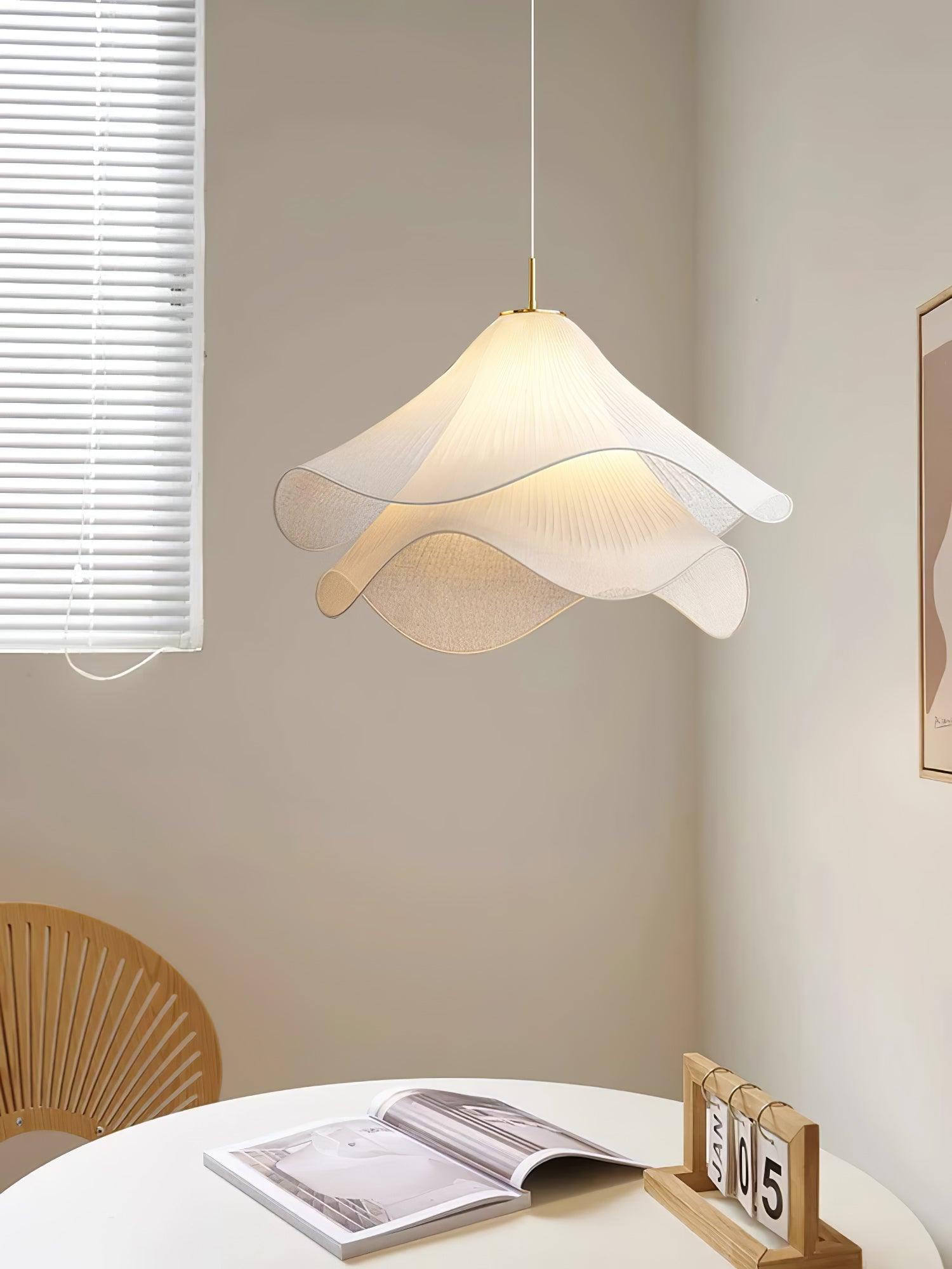 Ethereal Bloom plug-in pendant light glowing in a darkened room setting