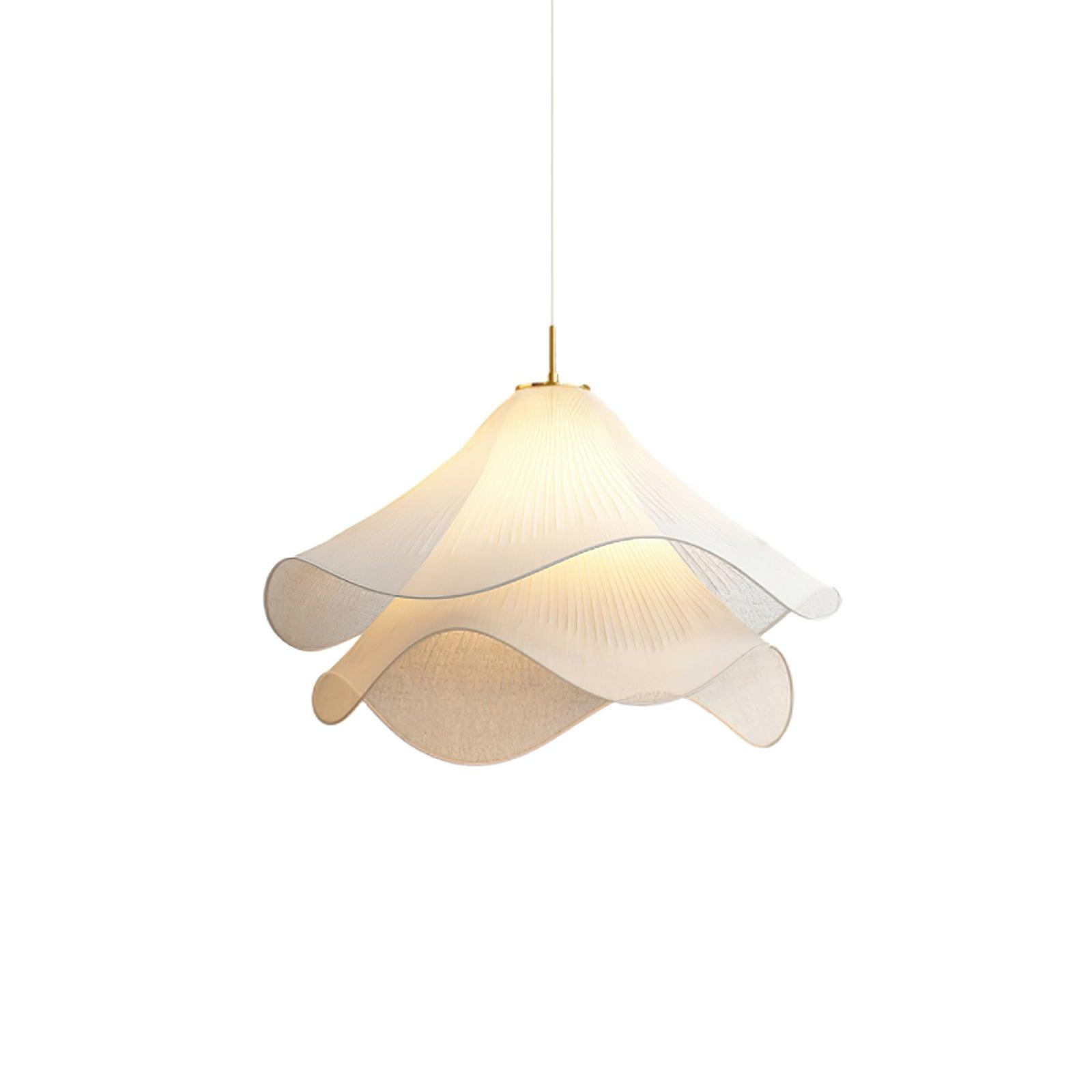 Ethereal Bloom plug-in pendant light hanging over a table with warm light through the pleats