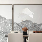 Ethereal Bloom pendant light glowing warmly in a relaxed home setting
