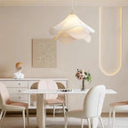 Ethereal Bloom plug-in pendant light glowing warmly in a relaxed home setting