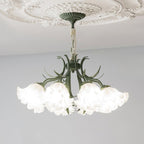 On a grey backdrop with its ceiling medallion mount, this Clérachic chandelier's arms spread into a wide fan of unlit blooms.