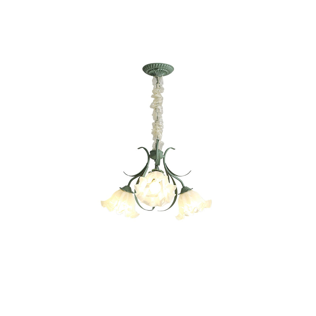 On a plain white backdrop, this Clérachic chandelier hangs unlit, its cluster of shades bunched close together.