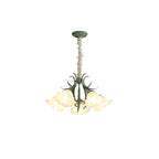 Against a white backdrop with its full chain shown, this Clérachic chandelier glows warm from its shades.