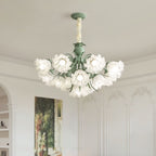 Angled against ornate wall panelling and a framed painting, this Clérachic chandelier's layered white shades glow warm.