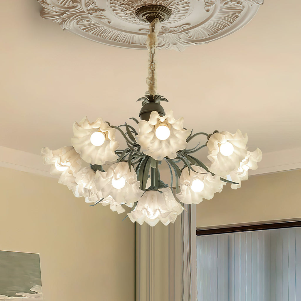 Mounted on a plaster ceiling medallion in a beige room, this Clérachic chandelier lights the space from above.