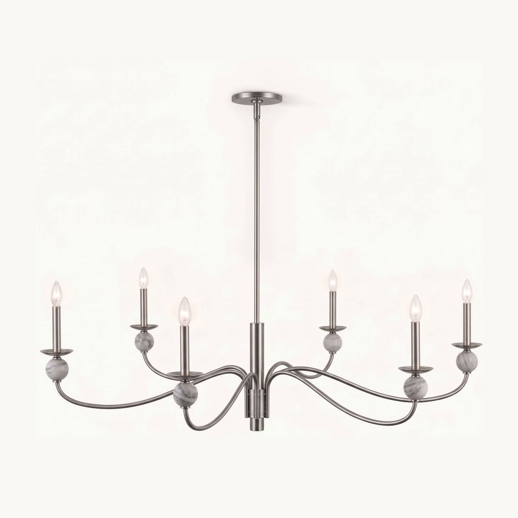 On a plain backdrop, this Clérachic chandelier shows its brushed nickel wave arms and stone ball accents, unlit and centred.