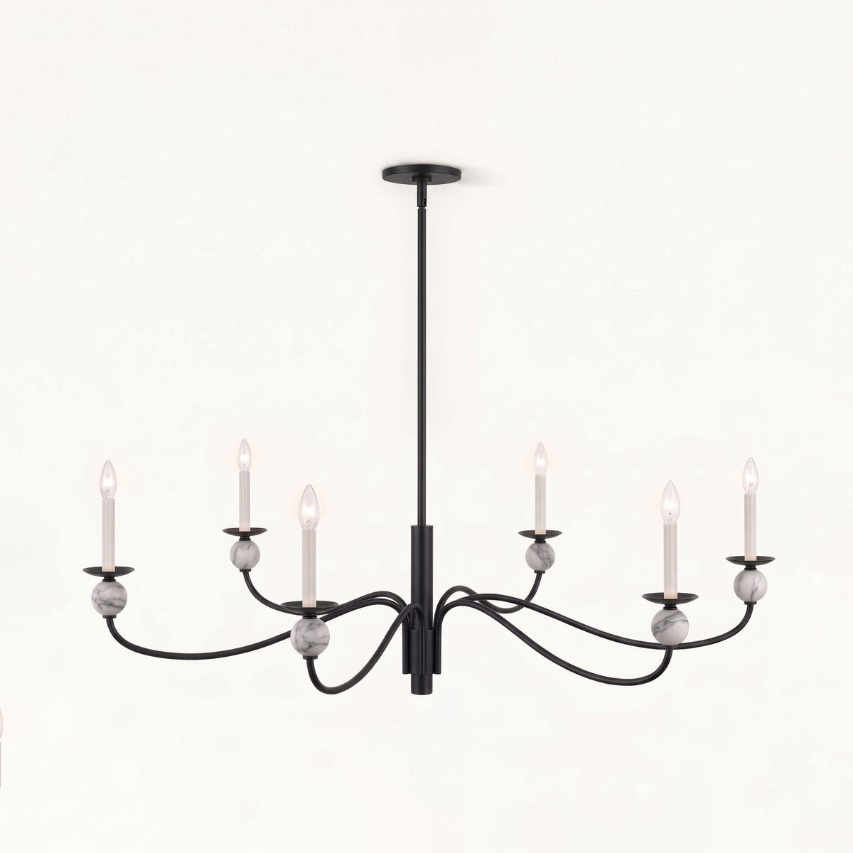 Front-facing on a plain backdrop, this Clérachic chandelier's matte black wave arms and stone ball accents stand out, unlit.