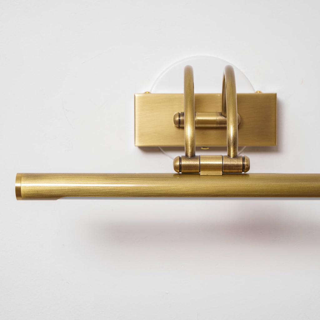 Slim linear vanity wall light shown in full from the side