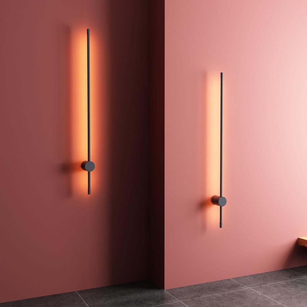 Linear LED wall light mounted vertically with soft glow